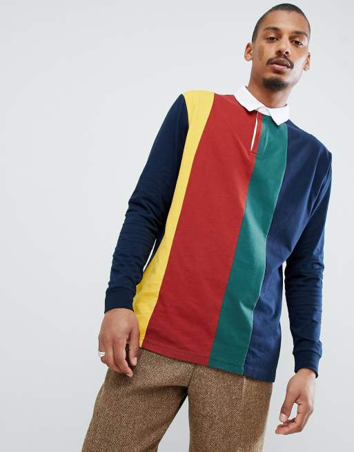 ASOS DESIGN - Polo de rugby décontracté à rayures color block verticales - Bleu marine