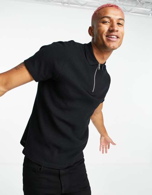 ASOS DESIGN - Polo in piqué nera con cerniera lampo