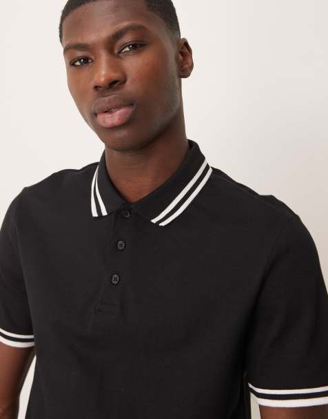 ASOS DESIGN - Polo in piqué nera con profili a contrasto - view 1