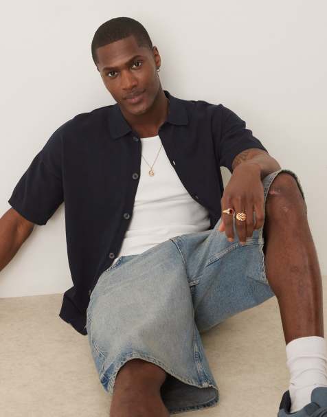 ASOS DESIGN - Polo leggera vestibilità comoda in maglia blu navy con bottoni - view 1