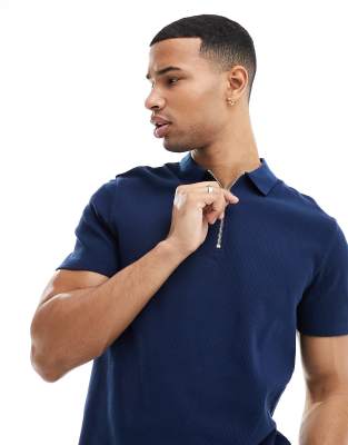 ASOS DESIGN - Polo met wafelstructuur en rits in marineblauw