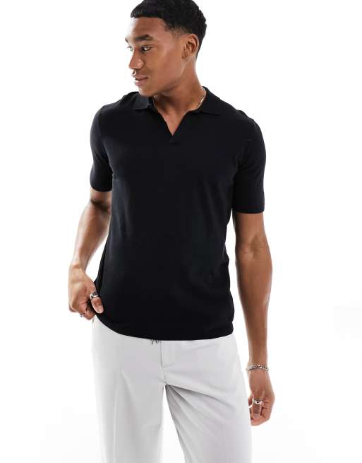 ASOS DESIGN - Polo nera oversize in maglia di cotone con intaglio sul collo