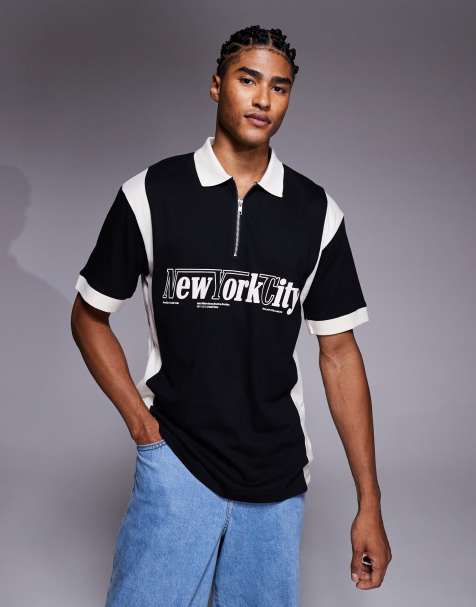 ASOS DESIGN - Polo nera vestibilità comoda con grafica di città e pannelli - view 1