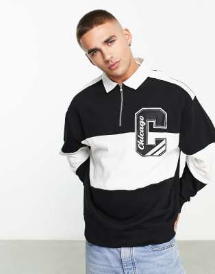 ASOS DESIGN - Polo oversize a righe stile rugby nera e bianca con stemma stile college
