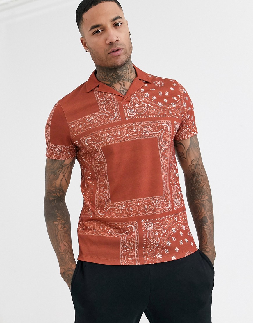 ASOS DESIGN polo shirt with revere collar and all over paisley print-Brown