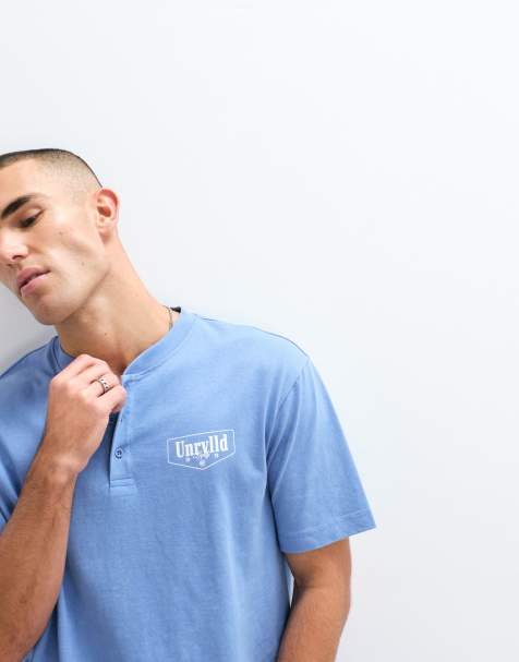 ASOS DESIGN - Polo squadrata pesante comoda lavaggio blu con scritta sul petto - view 1