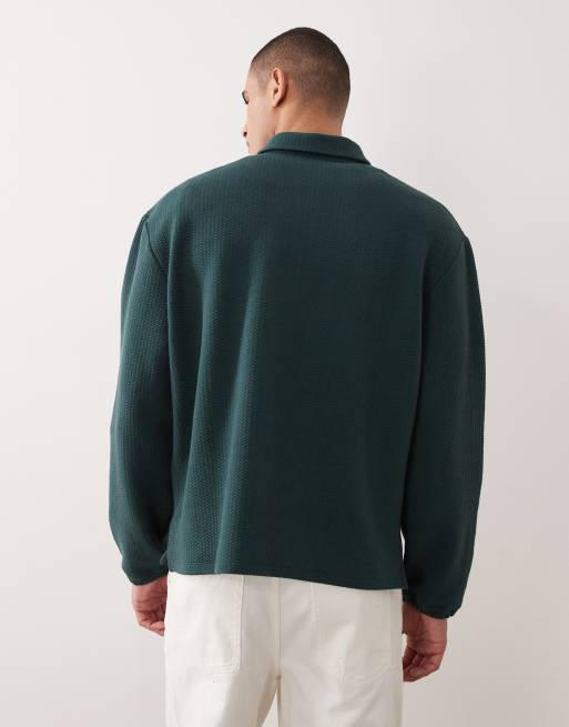 ASOS DESIGN – Polo-Sweatshirt in Dunkelgrün mit Bubble-Struktur, kurzem Reißverschluss und Oversize-Schnitt, 3 von 5
