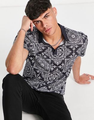 ASOS DESIGN polo t-shirt in all over paisley print  - BLACK