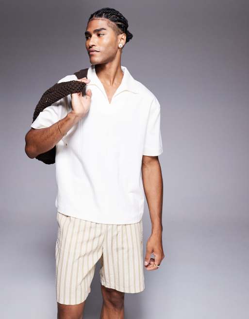 ASOS DESIGN - Polo vestibilità comoda squadrata color panna a coste con colletto a rever