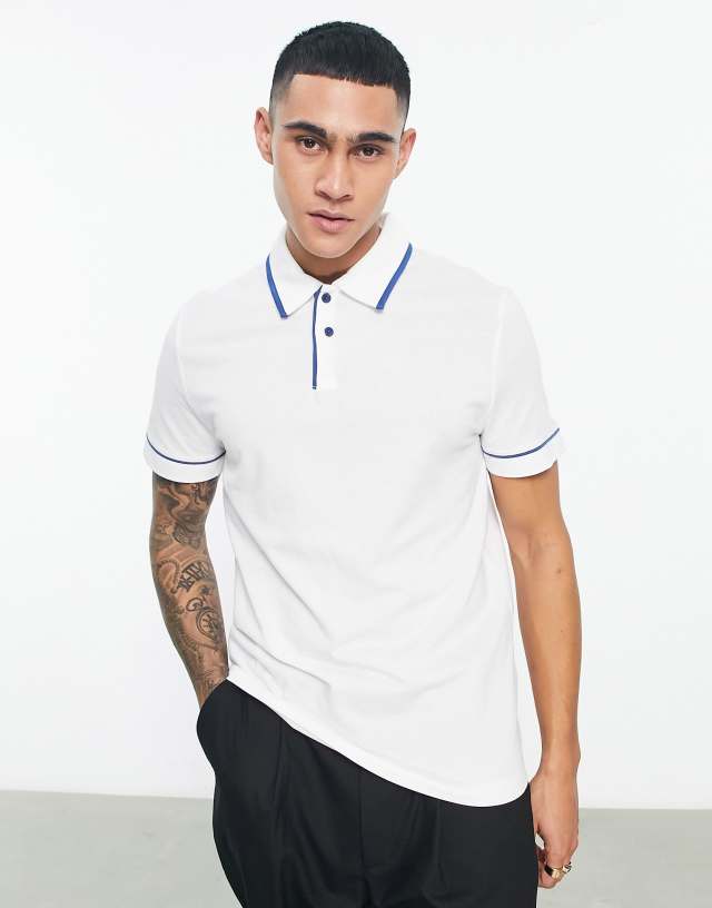 ASOS DESIGN polo with revere in white with navy trims