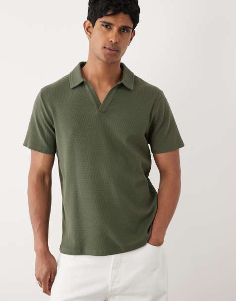 ASOS DESIGN – Polohemd in Dunkelgrün mit Reverskragen, regulärer Passform und Waffelstruktur - view 1