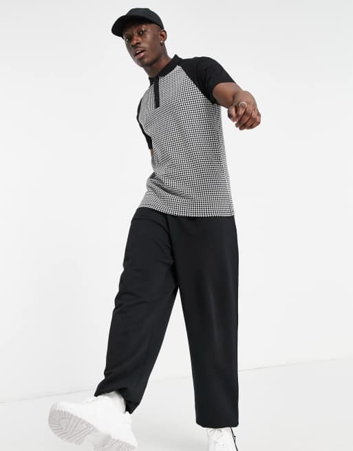 ASOS DESIGN – Polohemd in durchgehendem Hahnentrittmuster mit kontrastierenden Ärmeln, 4 von 4