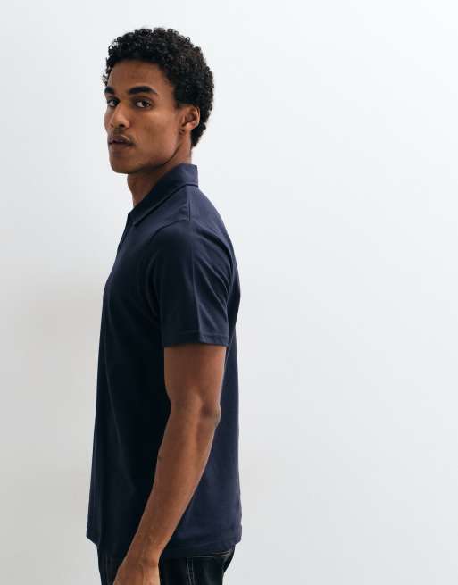 ASOS DESIGN Polohemd mit Reverskragen in Marineblau aus Piqué, 4 von 5
