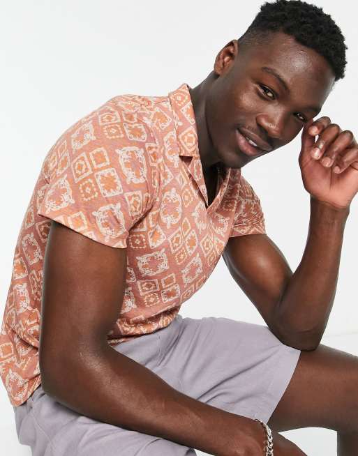 ASOS DESIGN - Poloshirt met reverskraag en bedekt met gehaakte print 