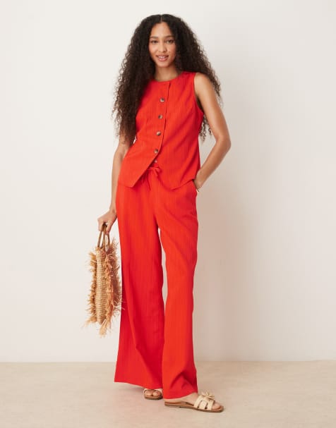 ASOS DESIGN crinkle palazzo trousers co-ord in orange