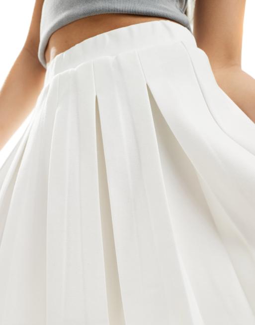 Designer white pleated skirt hotsell