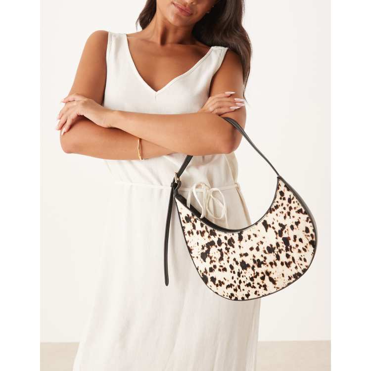ASOS DESIGN pony hair asymmetric scoop shoulder bag with buckle