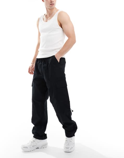 ASOS DESIGN poplin cargo pants in black with elastic waist - view 1