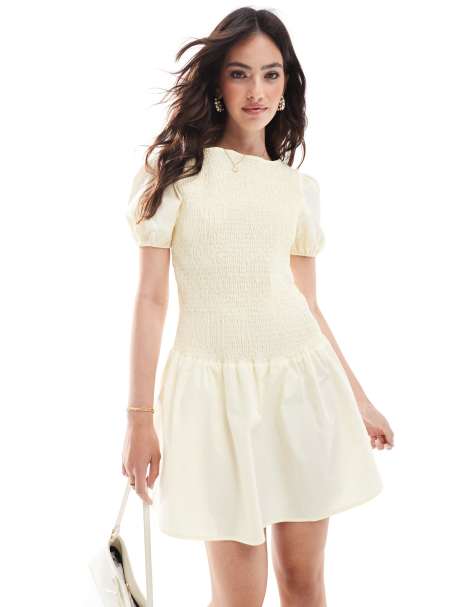 ASOS DESIGN poplin shirred puff sleeve mini dress in lemon - view 1