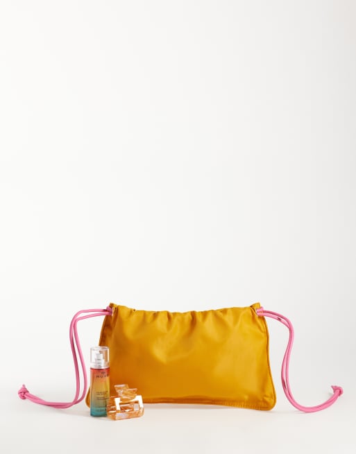 ASOS DESIGN pouch clutch bag in orange, 2 of 4