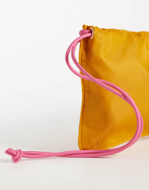 ASOS DESIGN pouch clutch bag in orange, 3 of 4