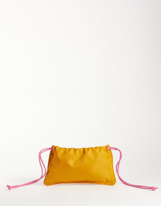 ASOS DESIGN pouch clutch bag in orange, 4 of 4