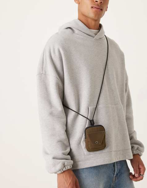 ASOS DESIGN pouch with strap in khaki - view 1