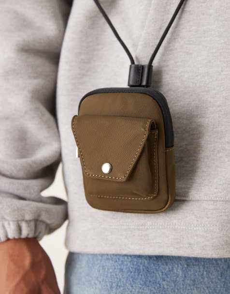 ASOS DESIGN pouch with strap in khaki - view 2