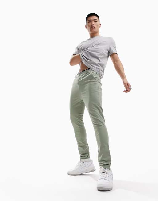 ASOS DESIGN power spray on jeans in light khaki