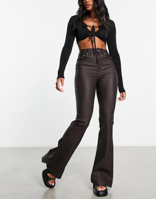 ASOS DESIGN Petite stretch faux leather flare trouser in black