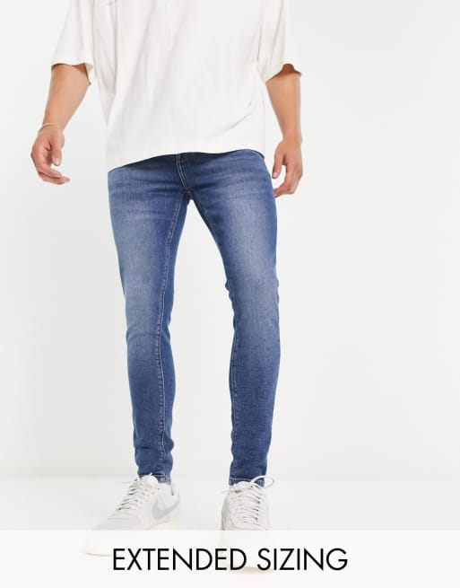 ASOS DESIGN power stretch jeans in dark wash blue