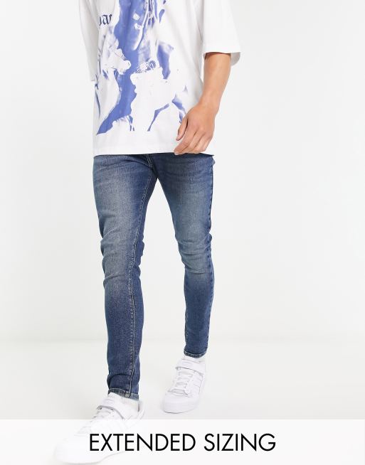 ASOS DESIGN power stretch jeans in dark wash blue