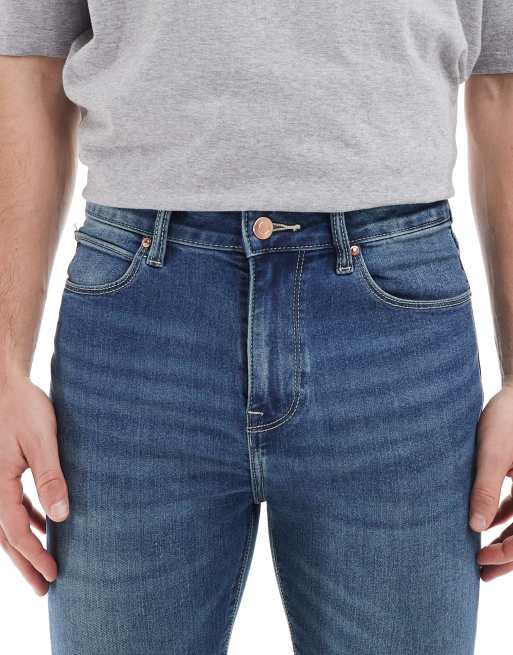 ASOS DESIGN power stretch jeans in dark wash blue