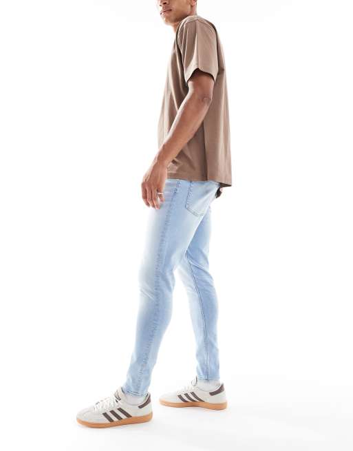 ASOS DESIGN power stretch jeans in light wash blue