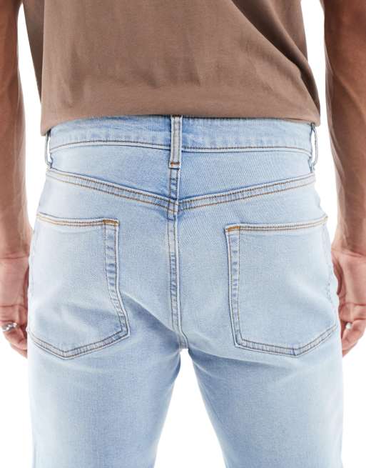 ASOS DESIGN power stretch jeans in light wash blue