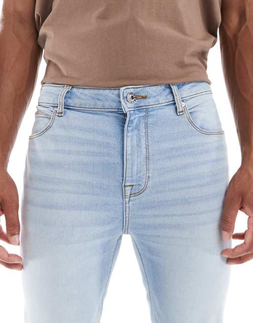 ASOS DESIGN power stretch jeans in light wash blue