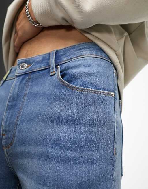 ASOS DESIGN power stretch jeans in mid wash blue, 3 of 5