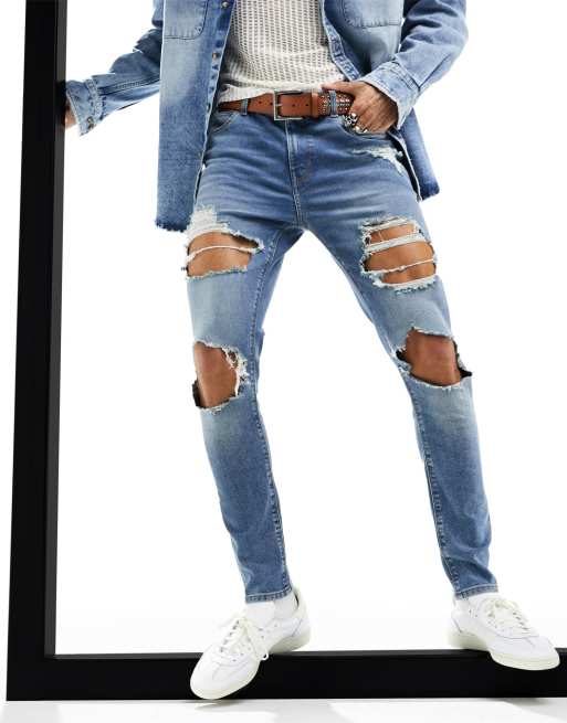 ASOS DESIGN power stretch jeans with all over rips in light wash blue, 6 of 6