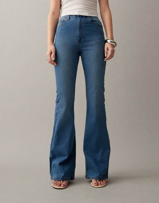 ASOS DESIGN power stretch sculpt flare jeans in mid blue, 4 of 7