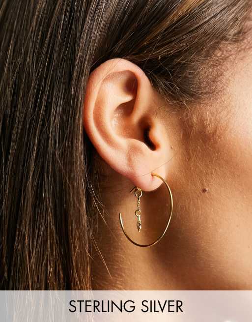 ASOS DESIGN – Pozłacane kolczyki-koła ze srebra wysokiej próby z zawieszką z gwiazdką