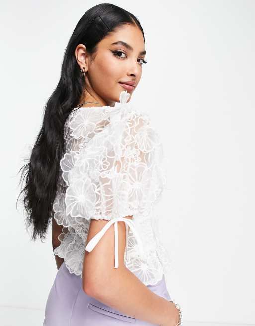 ASOS DESIGN tie front corset top with puff sleeve in white 3D floral lace