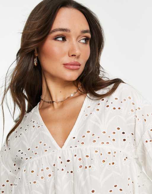 White broderie store peplum top