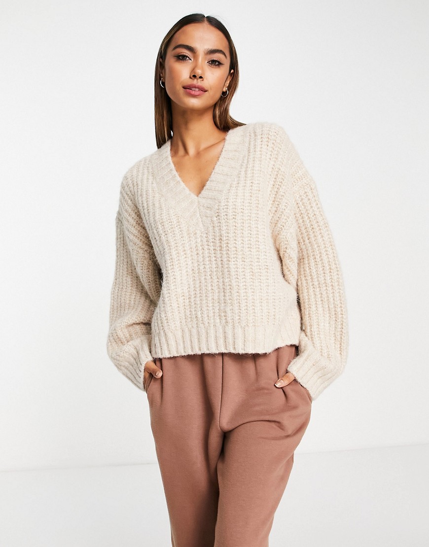 ASOS DESIGN premium chunky V neck oversized sweater in fluffy yarn in stone-Neutral