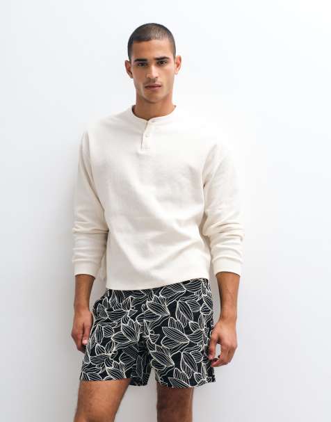 ASOS DESIGN Premium co-ord shorts with all over floral embroidery in black - view 1