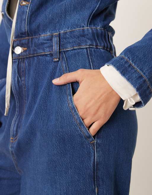 ASOS DESIGN premium collarless denim jumpsuit in midwash blue