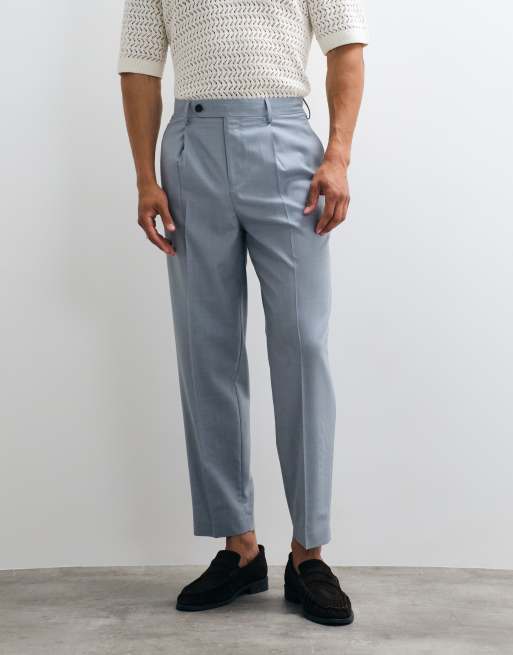 ASOS DESIGN – Premium – Dimblå, avslappnade, avsmalnande finbyxor i 100% ull, 2 av 5