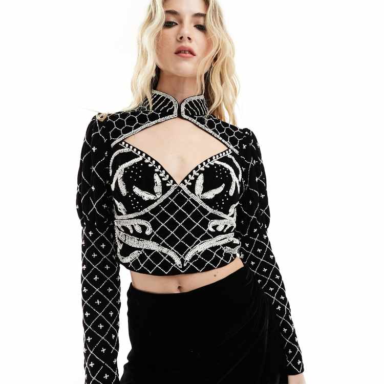 ASOS DESIGN premium embellished velvet and pearl cut out detail top in black ASOS