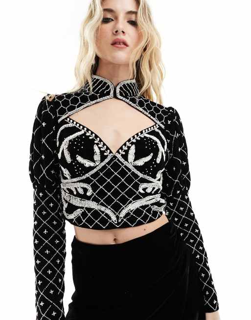 ASOS DESIGN premium embellished velvet and pearl cut out detail top in black