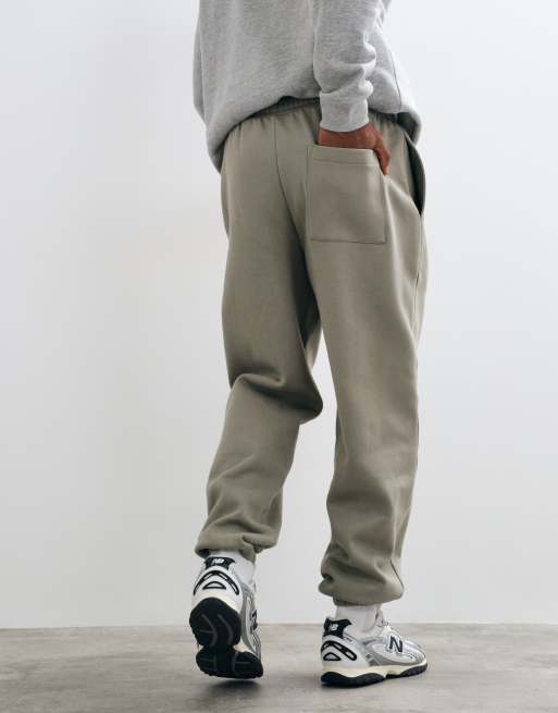 ASOS DESIGN premium heavyweight 400gsm oversized tuck jogger in green, 4 of 5