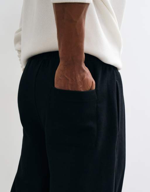 ASOS DESIGN premium heavyweight 400gsm slim balloon jogger in Black, 4 of 5